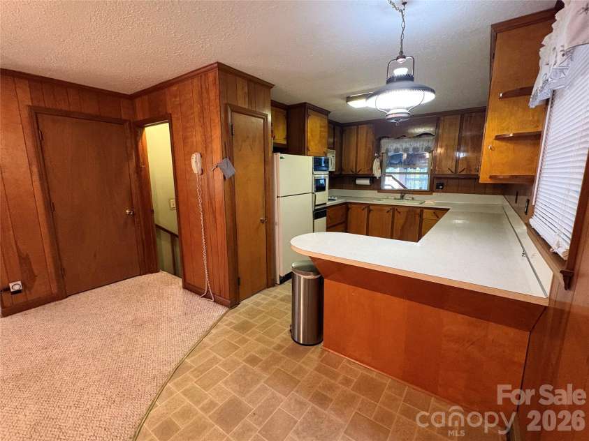 94 Tulip Avenue, Concord, NC 28025.  MLS# CAR4435284, YatesRealty ID 57141. Kitchen view