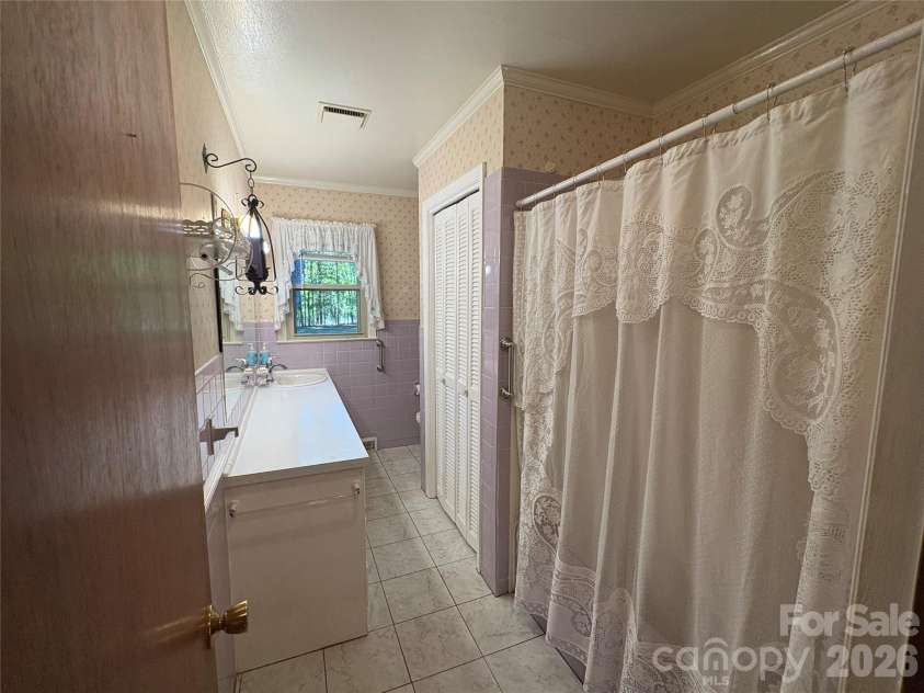 94 Tulip Avenue, Concord, NC 28025.  MLS# CAR4435284, YatesRealty ID 57141. Main Bathroom looking in