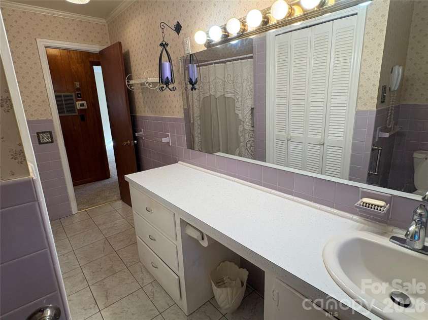 94 Tulip Avenue, Concord, NC 28025.  MLS# CAR4435284, YatesRealty ID 57141. Main Bathroom looking out