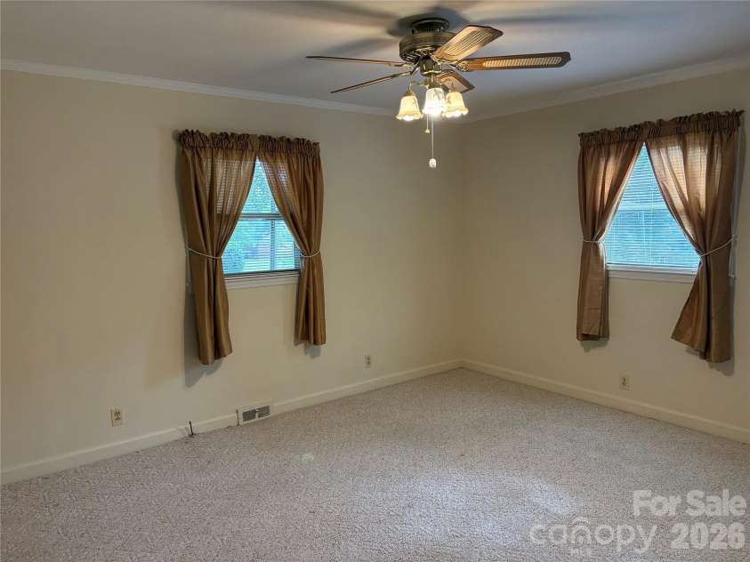 94 Tulip Avenue, Concord, NC 28025.  MLS# CAR4435284, YatesRealty ID 57141. Primary Bedroom 1