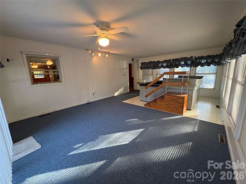 94 Tulip Avenue, Concord, NC 28025.  MLS# CAR4435284, YatesRealty ID 57141. Sun Room 2