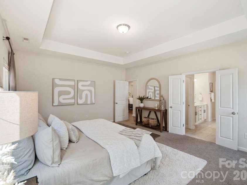 7656 Tanglewood Way, Denver, NC 28037.  MLS# CAR4434758, YatesRealty ID 57146. Large primary suite with tray ceiling