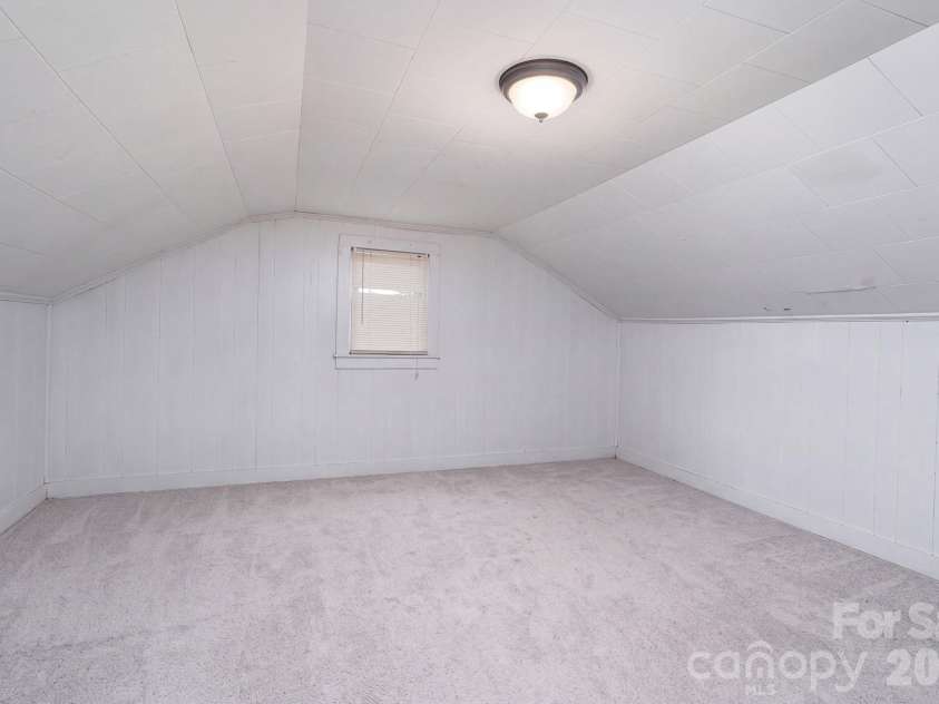 407 3rd Avenue, Hickory, NC 28602.  MLS# CAR4435465, YatesRealty ID 57147. Viral staging attic