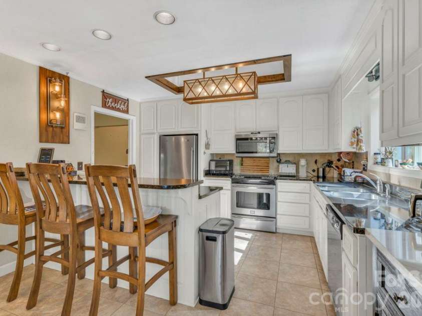 573 Watauga Street, Newland, NC 28657.  MLS# CAR4435246, YatesRealty ID 57148. 