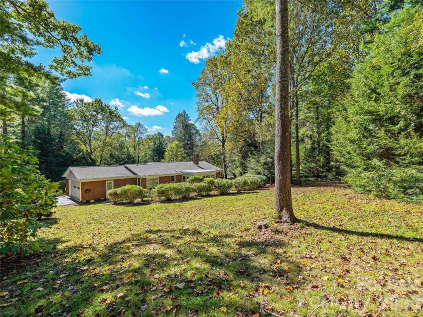133 Kent Lane, Hendersonville, NC 28739.  MLS# CAR4433472, YatesRealty ID 57156. Private Backyard is mostly Level