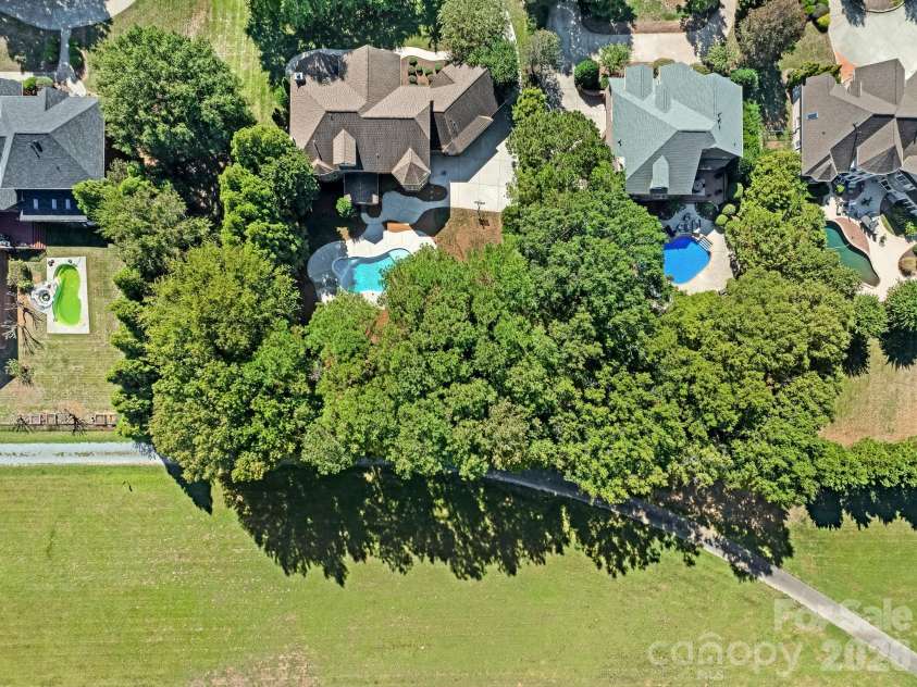 9200 Skipaway Drive, Waxhaw, NC 28173.  MLS# CAR4398254, YatesRealty ID 57165. Aerial View - Mature Trees