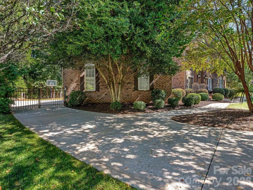 9200 Skipaway Drive, Waxhaw, NC 28173.  MLS# CAR4398254, YatesRealty ID 57165. Gate @ Driveway