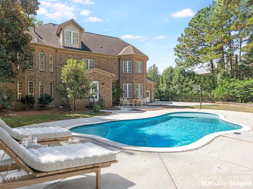 9200 Skipaway Drive, Waxhaw, NC 28173.  MLS# CAR4398254, YatesRealty ID 57165. Pool & Rear Elevation