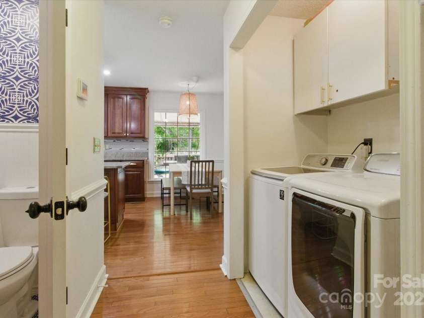 7514 Pewter Lane, Charlotte, NC 28270.  MLS# CAR4244658, YatesRealty ID 5718. Centrally located laundry and storage area on the main level.