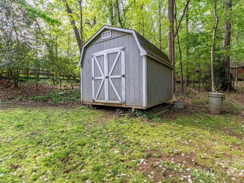 7514 Pewter Lane, Charlotte, NC 28270.  MLS# CAR4244658, YatesRealty ID 5718. Enjoy extra storage in the large shed.