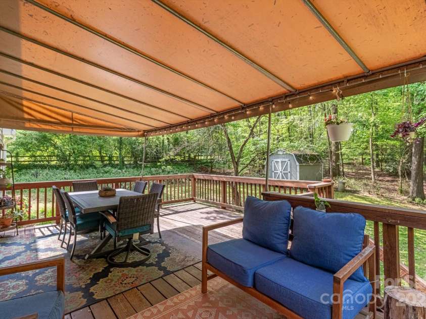 7514 Pewter Lane, Charlotte, NC 28270.  MLS# CAR4244658, YatesRealty ID 5718. Lounge, entertain, or play on the large deck.
