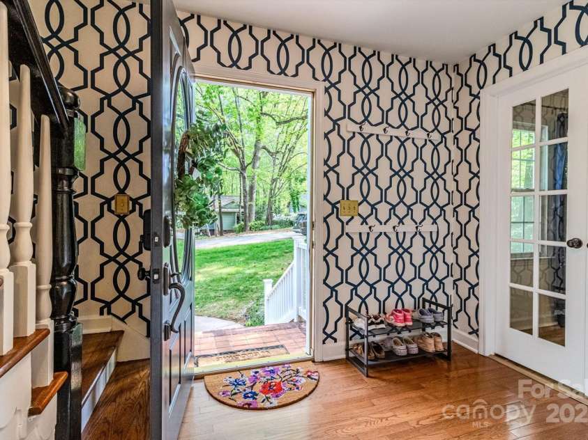 7514 Pewter Lane, Charlotte, NC 28270.  MLS# CAR4244658, YatesRealty ID 5718. The inviting and stylish entryway with drop zone and coat closet.