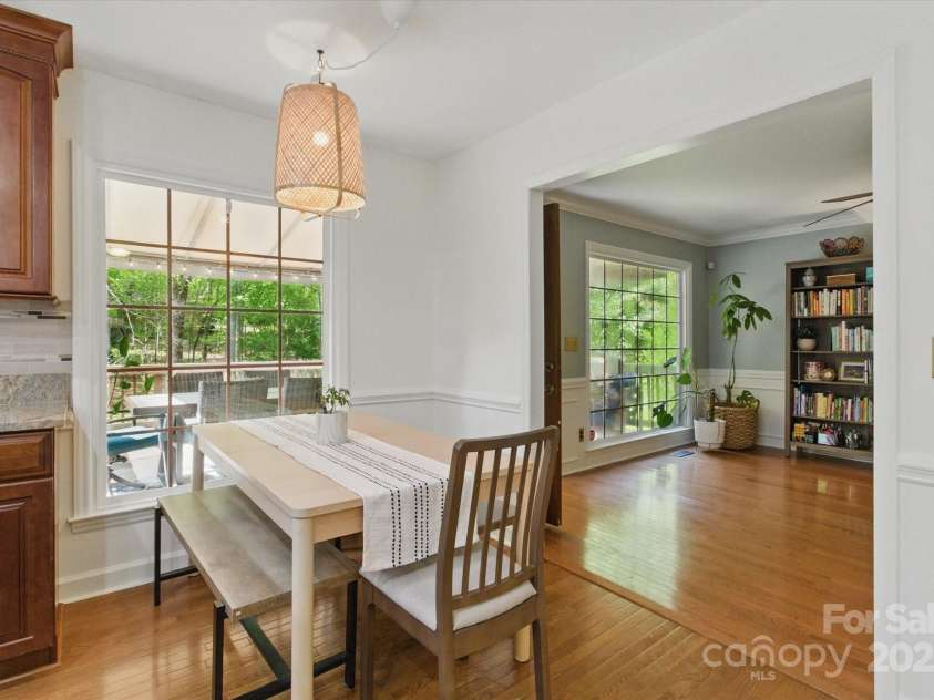 7514 Pewter Lane, Charlotte, NC 28270.  MLS# CAR4244658, YatesRealty ID 5718. The kitchen seamlessly transitions into the breakfast area.