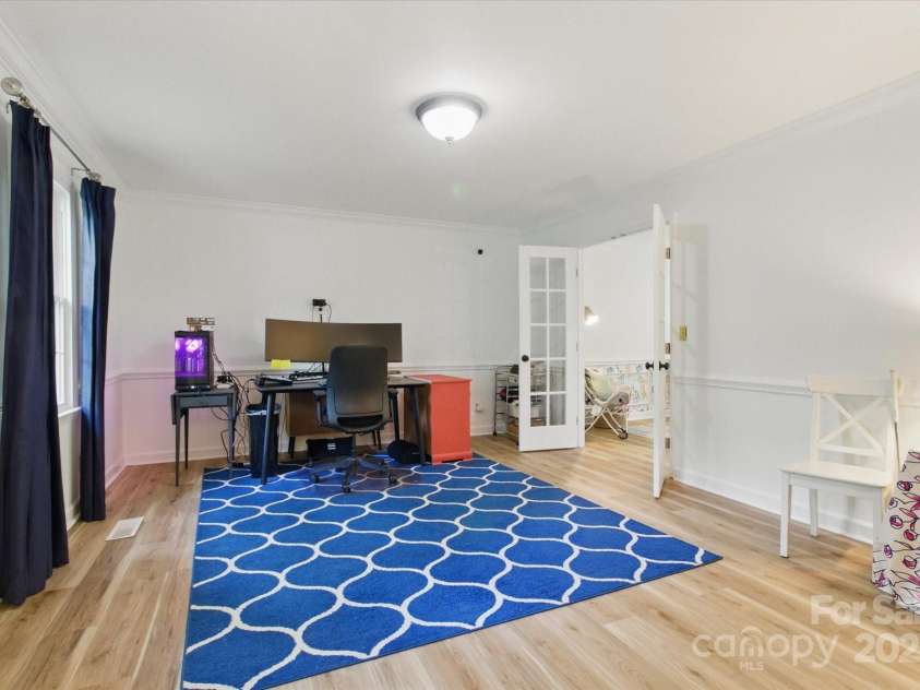 7514 Pewter Lane, Charlotte, NC 28270.  MLS# CAR4244658, YatesRealty ID 5718. This space could be used as an office, play area, family room, etc.