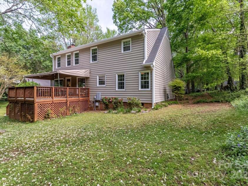 7514 Pewter Lane, Charlotte, NC 28270.  MLS# CAR4244658, YatesRealty ID 5718. View of the back of the home and deck.