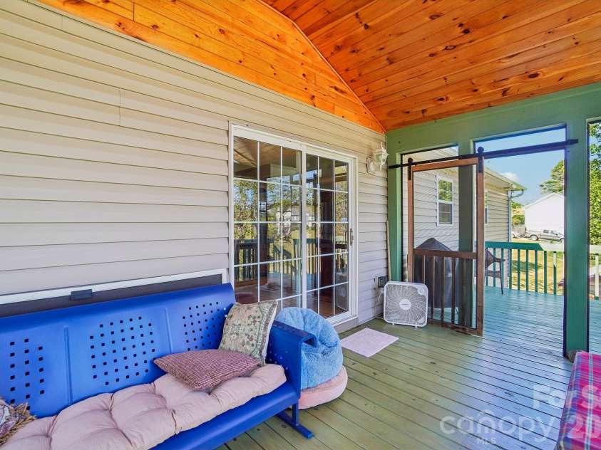 499 Flint Hill Road, Alexander, NC 28701.  MLS# CAR4409425, YatesRealty ID 57181. Back Screened in porch