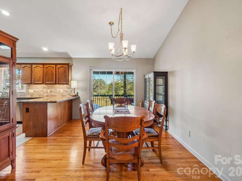 499 Flint Hill Road, Alexander, NC 28701.  MLS# CAR4409425, YatesRealty ID 57181. Dining area
