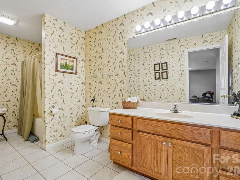 499 Flint Hill Road, Alexander, NC 28701.  MLS# CAR4409425, YatesRealty ID 57181. Downstairs Bath