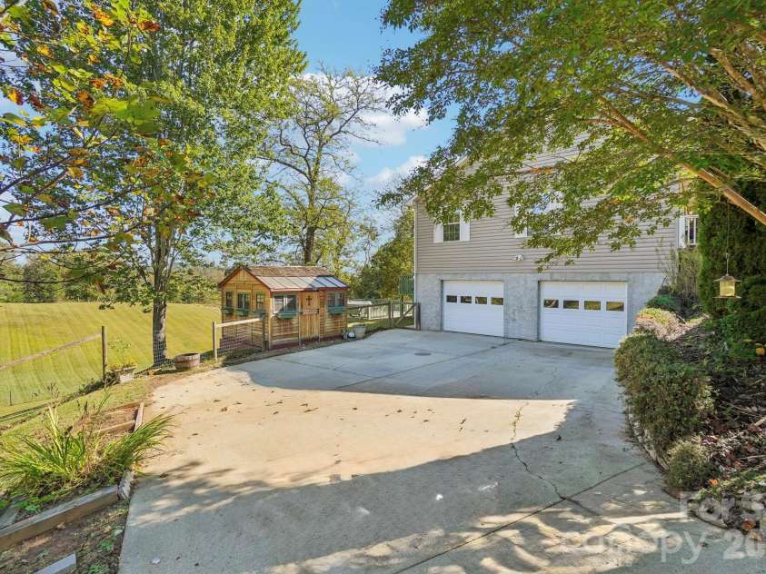 499 Flint Hill Road, Alexander, NC 28701.  MLS# CAR4409425, YatesRealty ID 57181. Drive to two car garage