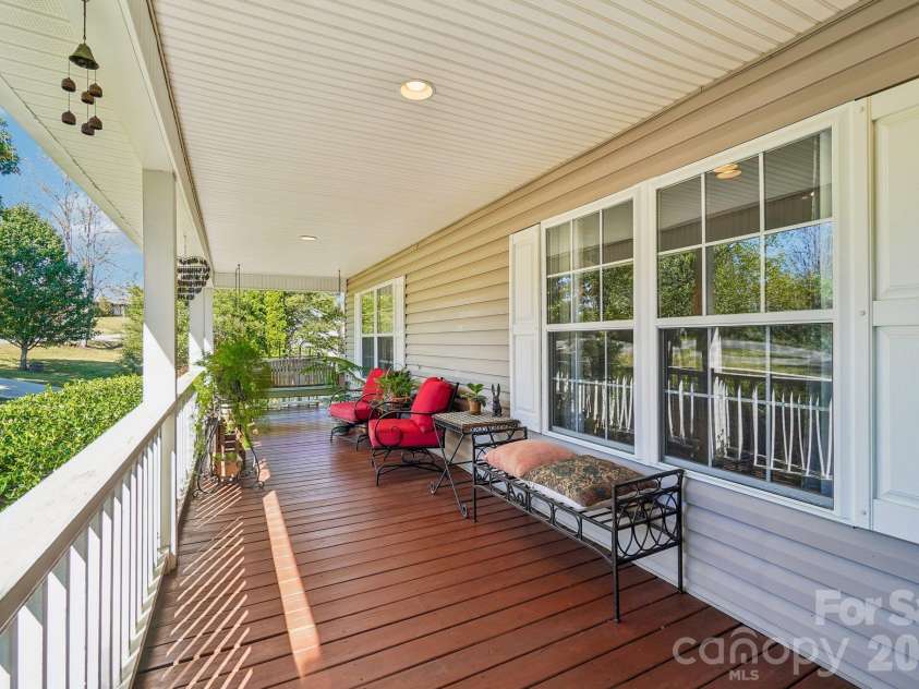 499 Flint Hill Road, Alexander, NC 28701.  MLS# CAR4409425, YatesRealty ID 57181. Front porch