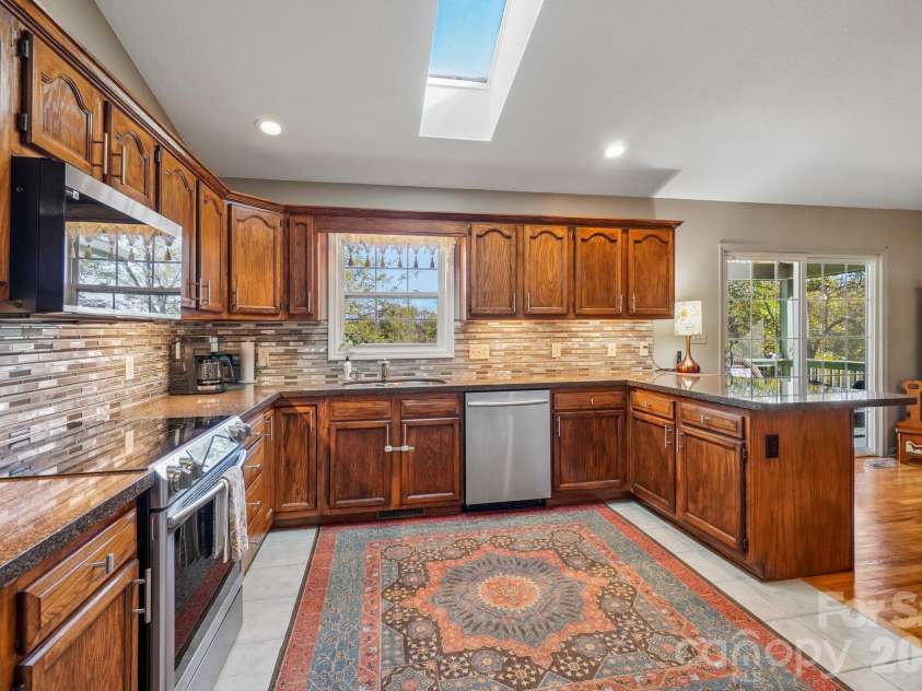 499 Flint Hill Road, Alexander, NC 28701.  MLS# CAR4409425, YatesRealty ID 57181. Kitchen