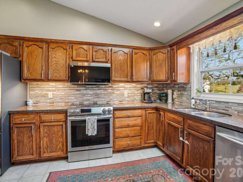 499 Flint Hill Road, Alexander, NC 28701.  MLS# CAR4409425, YatesRealty ID 57181. Kitchen