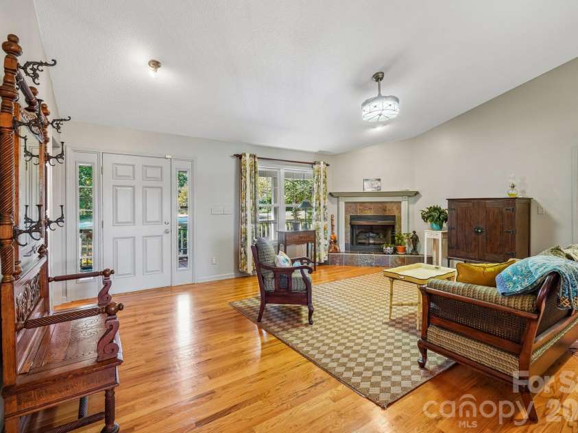 499 Flint Hill Road, Alexander, NC 28701.  MLS# CAR4409425, YatesRealty ID 57181. Living Room