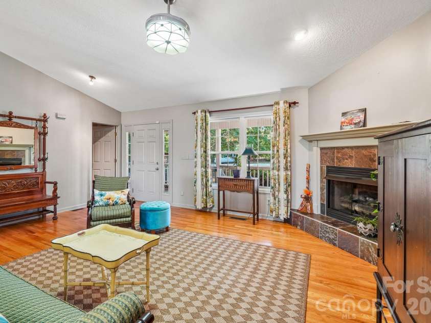 499 Flint Hill Road, Alexander, NC 28701.  MLS# CAR4409425, YatesRealty ID 57181. Living Room