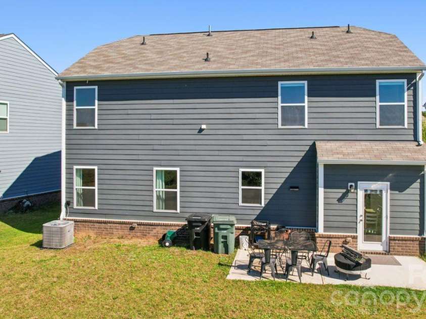 2625 Trinity Street, Monroe, NC 28110.  MLS# CAR4435545, YatesRealty ID 57186. Back patio