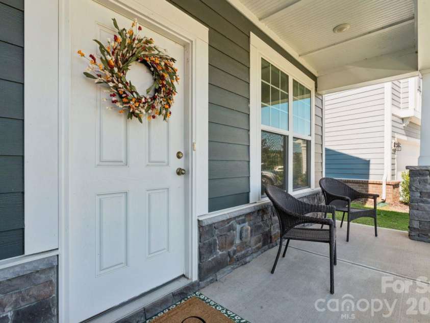 2625 Trinity Street, Monroe, NC 28110.  MLS# CAR4435545, YatesRealty ID 57186. Front porch large enough for rocking chairs!