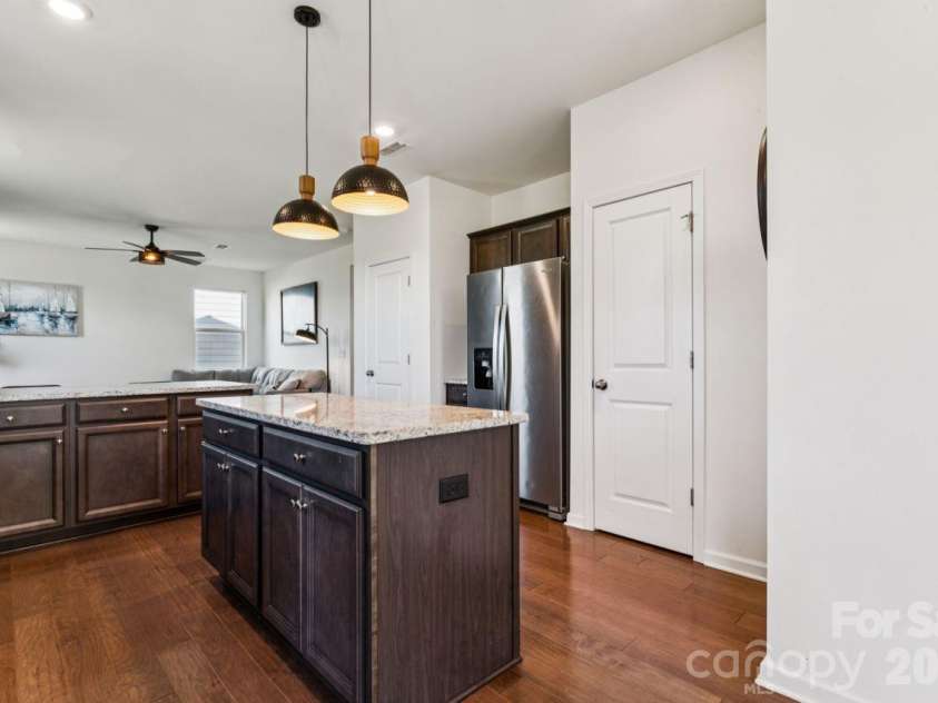 2625 Trinity Street, Monroe, NC 28110.  MLS# CAR4435545, YatesRealty ID 57186. Functional island for food prep