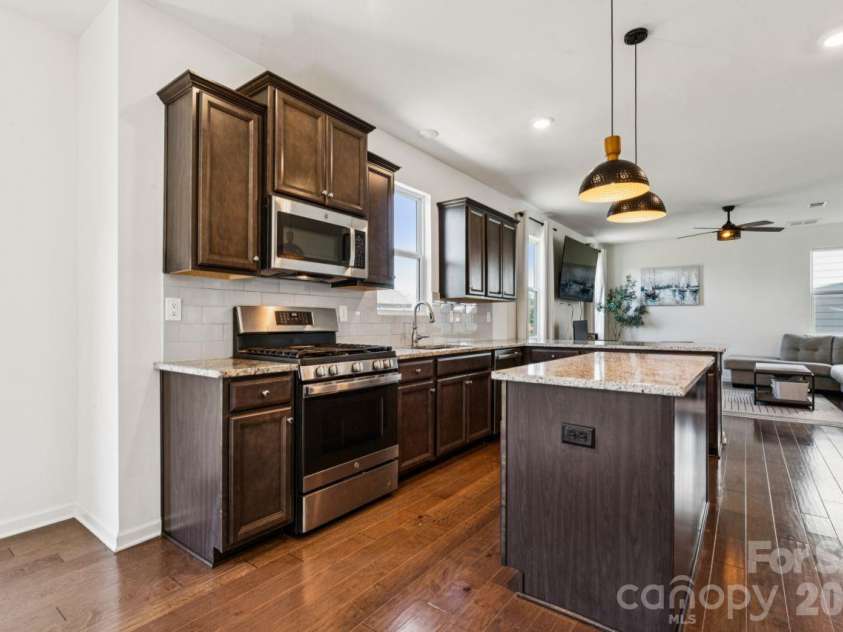 2625 Trinity Street, Monroe, NC 28110.  MLS# CAR4435545, YatesRealty ID 57186. Kitchen with gas stove