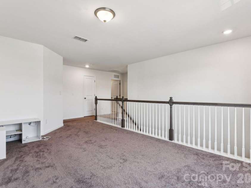 2625 Trinity Street, Monroe, NC 28110.  MLS# CAR4435545, YatesRealty ID 57186. Upstairs loft area
