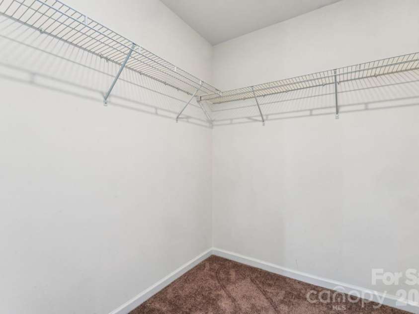 2625 Trinity Street, Monroe, NC 28110.  MLS# CAR4435545, YatesRealty ID 57186. Walk-in closet in primary bedroom