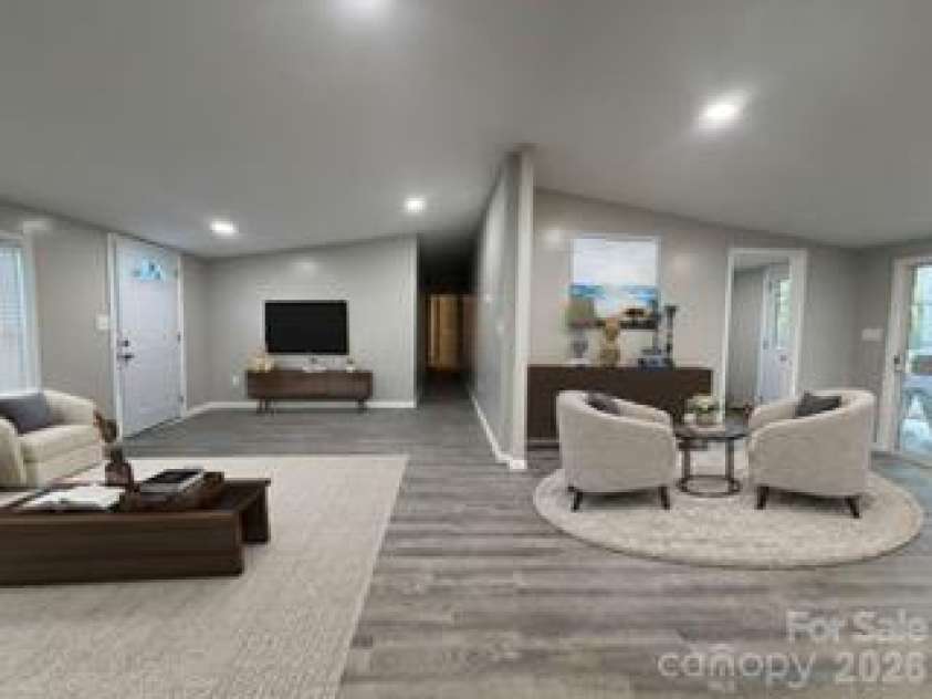 282 Dixon Road, Lancaster, SC 29720.  MLS# CAR4434927, YatesRealty ID 57190. Digitally Enhanced Family/ Dining Room 2