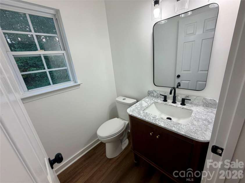 116 Huckleberry Lane, Mount Holly, NC 28120.  MLS# CAR4434900, YatesRealty ID 57235. Half Bath on main level.  NEW LVP Flooring on main level.