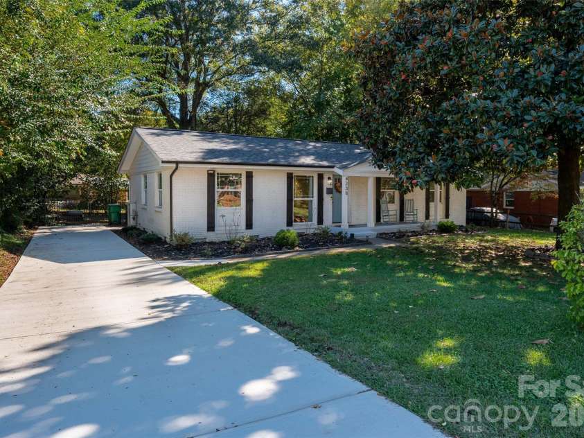 4238 Dowling Drive, Charlotte, NC 28205.  MLS# CAR4434485, YatesRealty ID 57237. Brand new concrete driveway and front walkway