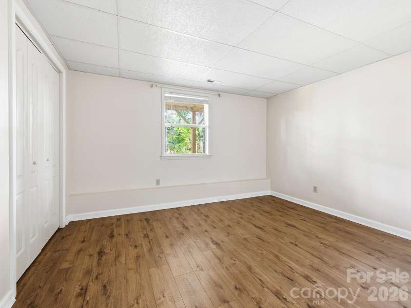 8 Rasada Extension, Weaverville, NC 28787.  MLS# CAR4435147, YatesRealty ID 57238. Flex Space/Office Downstairs