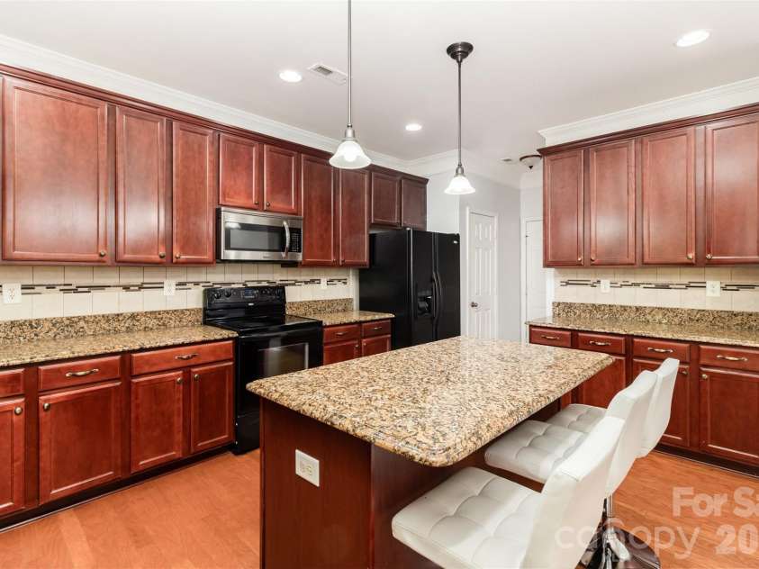 14038 Pinyon Pine Lane, Charlotte, NC 28215.  MLS# CAR4339783, YatesRealty ID 5724. 