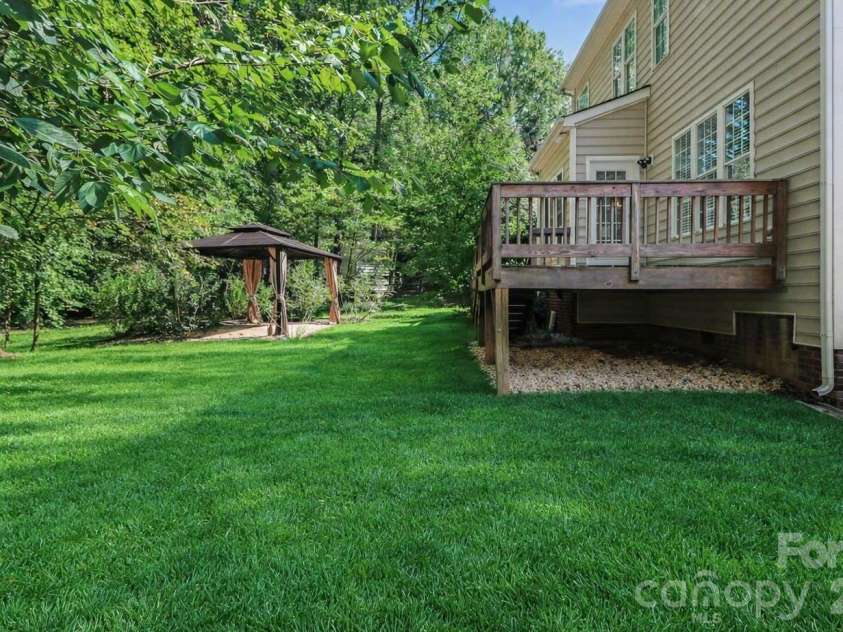 17028 Hampton Trace Road, Huntersville, NC 28078.  MLS# CAR4435476, YatesRealty ID 57242. Backyard with Deck & Gazebo