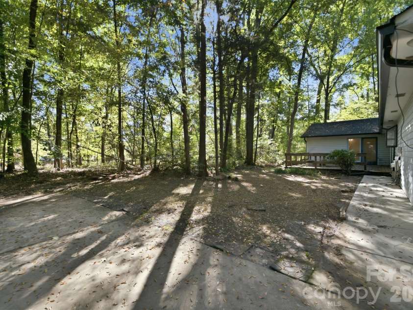 8607 Wellington Lane, Harrisburg, NC 28075.  MLS# CAR4435487, YatesRealty ID 57245. Backyard