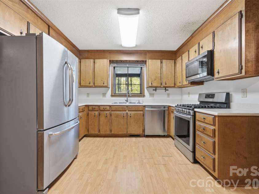 8607 Wellington Lane, Harrisburg, NC 28075.  MLS# CAR4435487, YatesRealty ID 57245. Kitchen