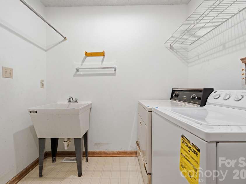 8607 Wellington Lane, Harrisburg, NC 28075.  MLS# CAR4435487, YatesRealty ID 57245. Laundry Room