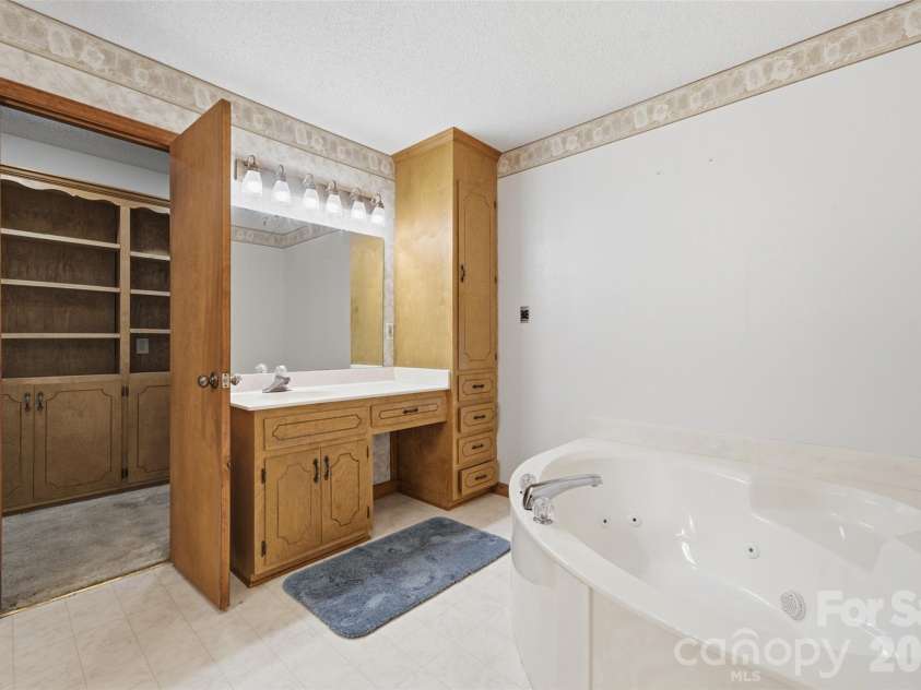 8607 Wellington Lane, Harrisburg, NC 28075.  MLS# CAR4435487, YatesRealty ID 57245. Primary Bathroom