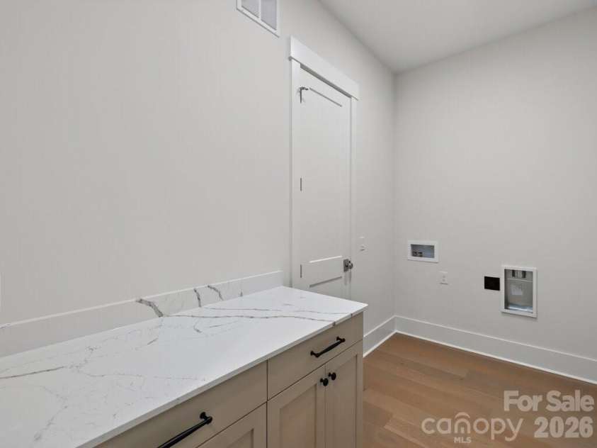 1002 Kingbird Lane, Clover, SC 29710.  MLS# CAR4355913, YatesRealty ID 5726. Laundry First Floor