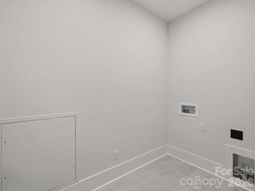 1002 Kingbird Lane, Clover, SC 29710.  MLS# CAR4355913, YatesRealty ID 5726. Second Floor Laundry Room