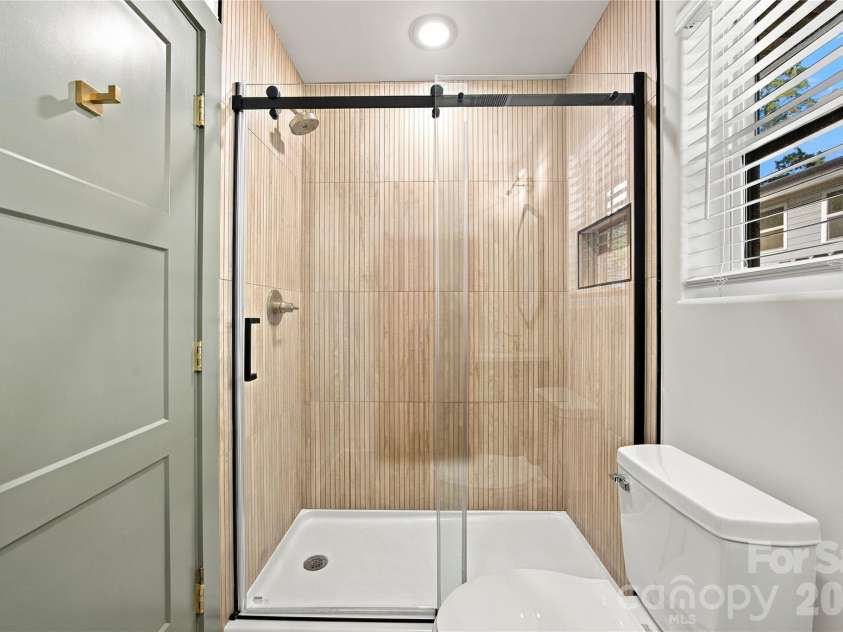 571 Buford Drive, Concord, NC 28025.  MLS# CAR4434170, YatesRealty ID 57269. Primary ensuite bath