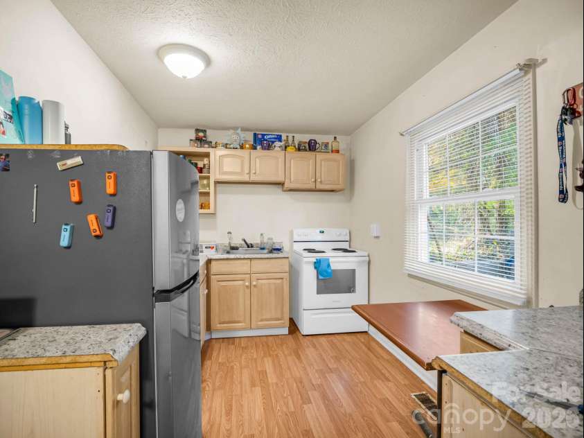 228 Stoney Mountain Road, Hendersonville, NC 28791.  MLS# CAR4434521, YatesRealty ID 57279. Unit A Kitchen