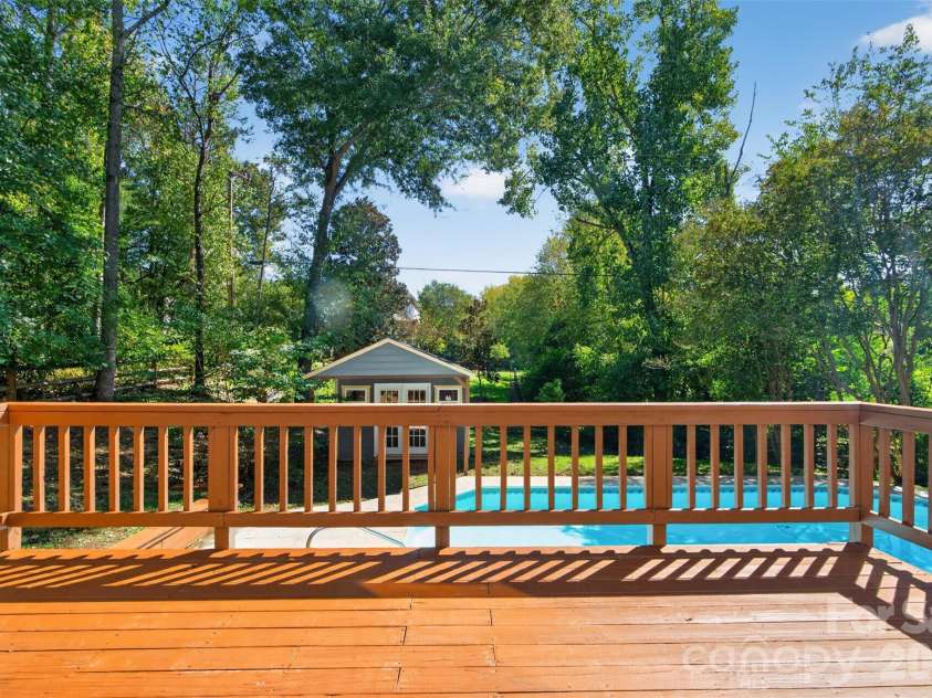 12427 Woodside Falls Road, Pineville, NC 28134.  MLS# CAR4435585, YatesRealty ID 57280. Freshly stained deck