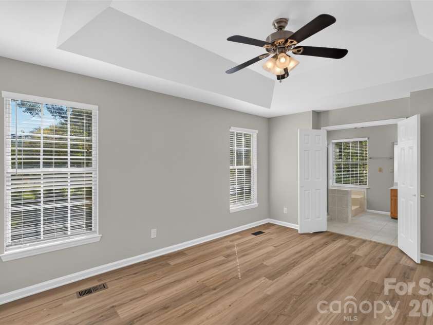 12427 Woodside Falls Road, Pineville, NC 28134.  MLS# CAR4435585, YatesRealty ID 57280. Primary Bedroom